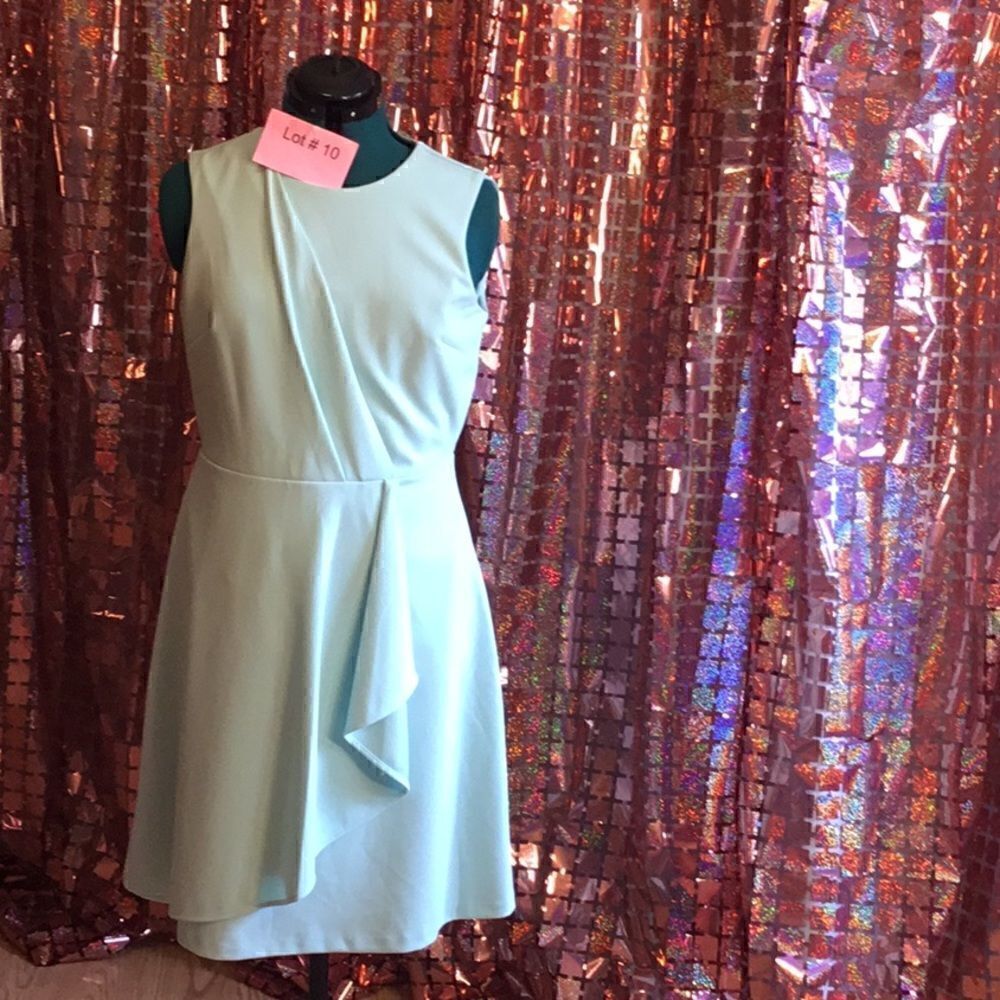 Light mint green sleeveless dress with full skirt in size 10 by CALVIN KLEIN
